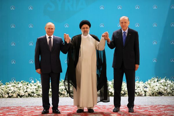 Russia's President Vladimir Putin (L), Iranian President Ebrahim Raisi (C) and Turkish President Recep Tayyip Erdogan (R) at an Astana Process meeting on Syrian conflict settlement. July 19, 2022. - Sputnik International