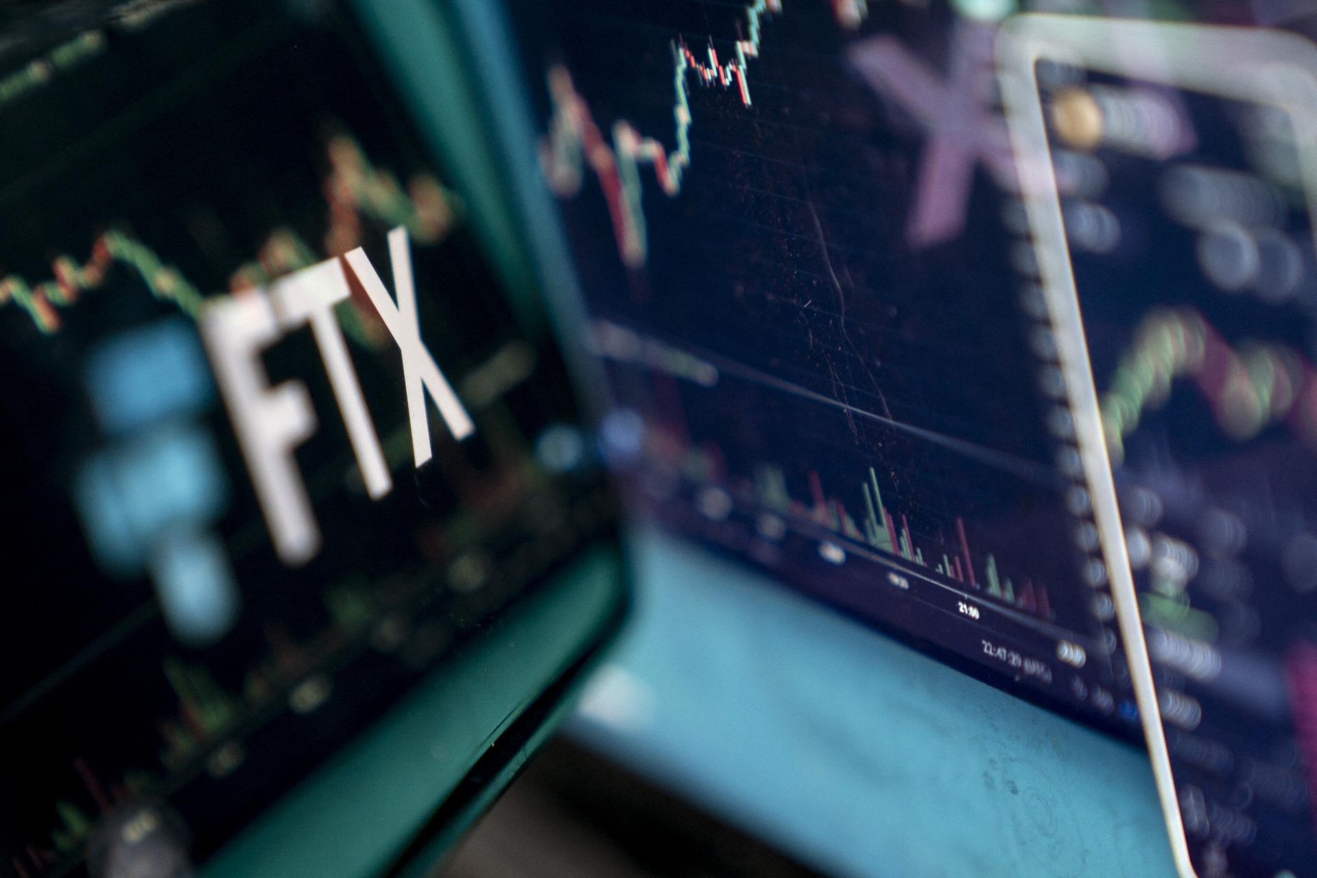This photo illustration shows the logo of cryptocurrency FTX, reflected in its website on a laptop screen in Washington, DC, on November 13, 2022. - Sputnik International, 1920, 31.12.2022