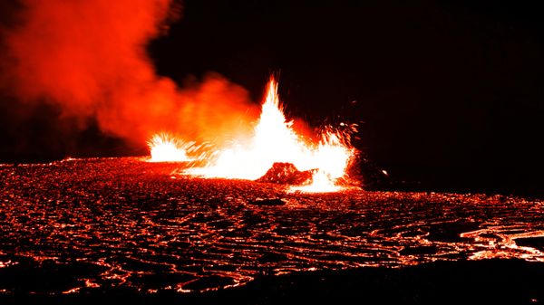 A photo taken on August 7, 2022 shows lava spewing out at the volcano in Fagradalsfjall, Iceland, around 40 kilometers from the capital Reykjavik, following an eruption that has been ongoing since August 3, 2022 - Sputnik International