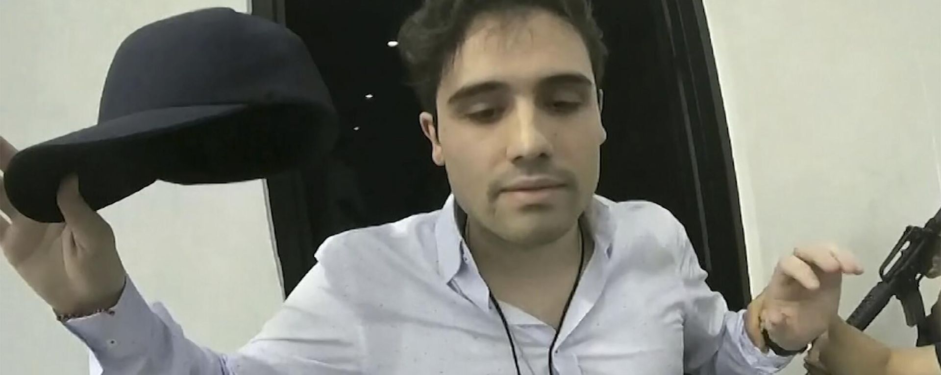 FILE - On October 17, 2019, a video fragment provided by the Mexican government shows Ovidio Guzmán López at the time of his arrest, in Culiacan, Mexico. Mexican security forces were forced to release the son of Sinaloa cartel leader Joaquin El Chapo Guzman that day after a shootout in the western city of Culiacan. FILE - On October 17, 2019, a video fragment provided by the Mexican government shows Ovidio Guzmán López at the time of his arrest, in Culiacan, Mexico. Mexican security forces were forced to release the son of Sinaloa cartel leader Joaquin El Chapo Guzman that day after a shootout in the western city of Culiacan. - Sputnik International, 1920, 07.01.2023