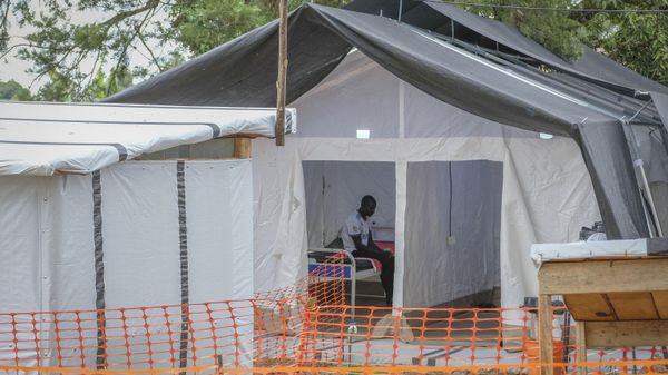 An Ebola patient sits inside the Ebola isolation center of Madudu Health Center III, in the village of Madudu, in the Mubende district of Uganda Tuesday, Nov. 1, 2022. Ugandan health officials say they have controlled the spread of a strain of Ebola that has no proven vaccine, but there are pockets of resistance to health measures among some in rural communities where illiteracy is high and restrictions on movement and business activity have left many bitter. - Sputnik International