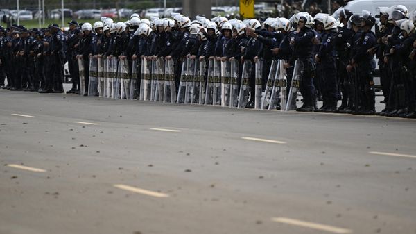 Police forces stand guard as soldiers dismantle a camp by supporters of Brazil's far-right ex-president Jair Bolsonaro - Sputnik International