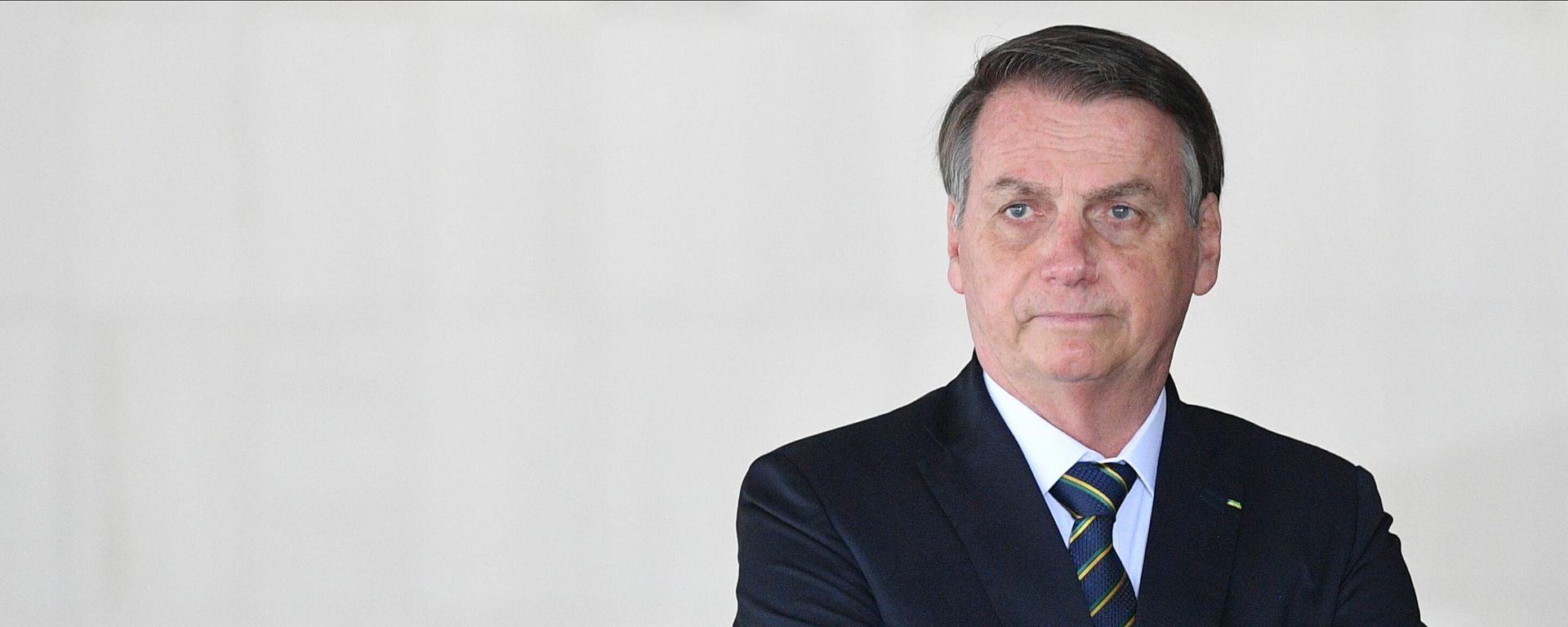 Brazil's then-President Jair Bolsonaro waits before a family photo at the 11th BRICS leaders summit, in Brazilia, Brazil. Brazil's then-President Jair Bolsonaro waits before a family photo at the 11th BRICS leaders summit, in Brazilia, Brazil. - Sputnik International, 1920, 14.01.2023
