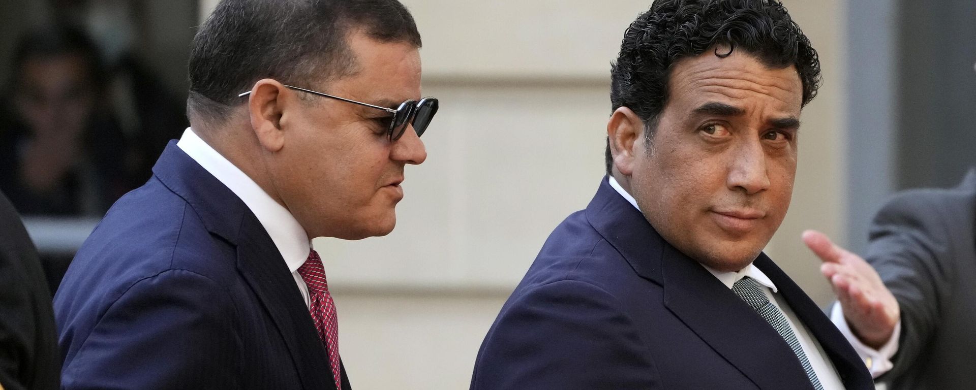 Libyan Prime Minister Abdul Hamid Dbeibah, left, and head of the Presidential Council of Libya Mohamed al-Menfi arrive for a conference with several world leaders in Paris, Friday, Nov. 12, 2021. - Sputnik International, 1920, 10.01.2023