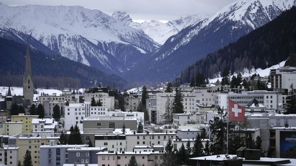 A Swiss national flag waves on a building in Davos, Switzerland, Sunday, Jan. 15, 2023. - Sputnik International