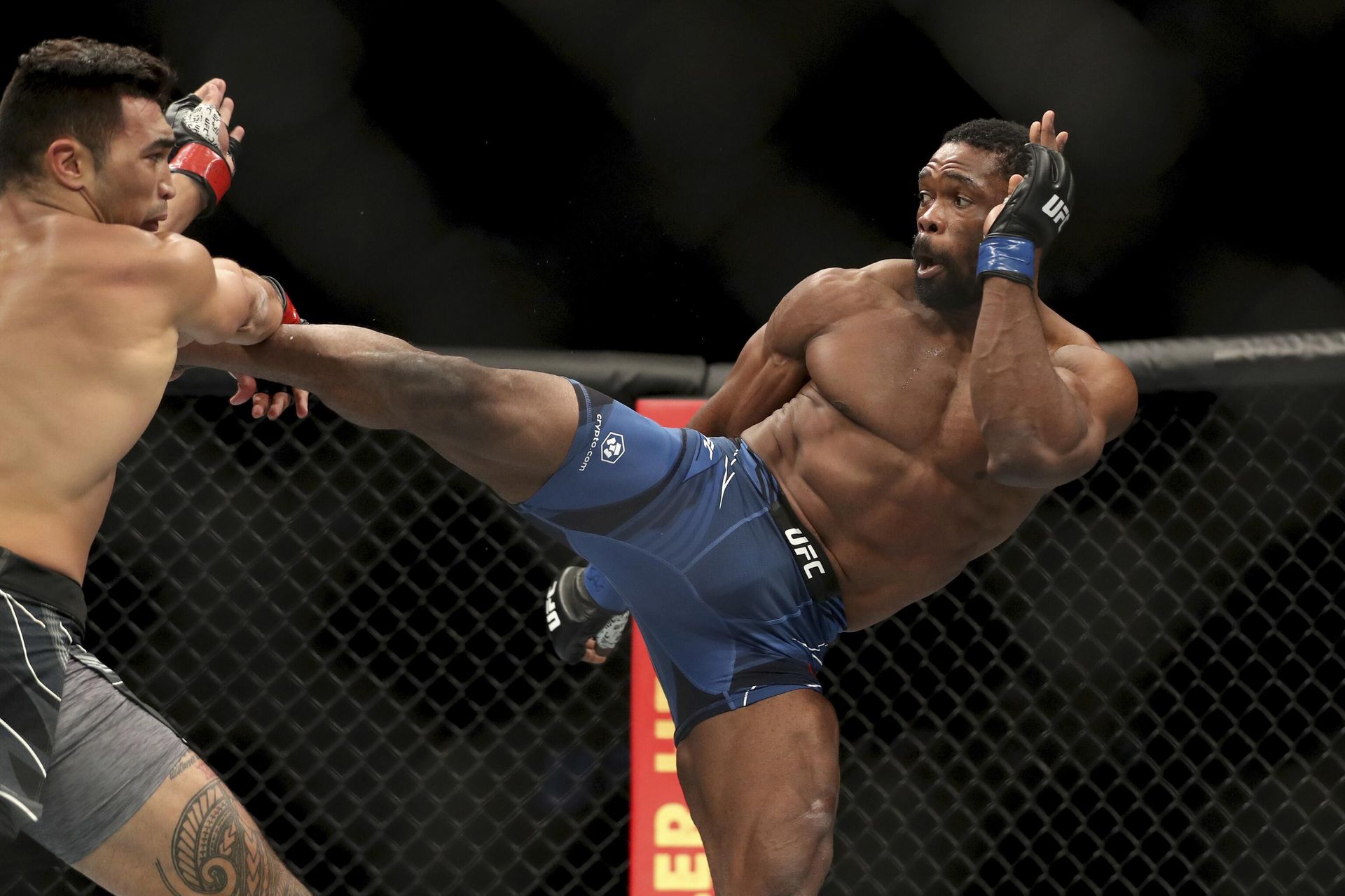 Punahele Soriano absorbs a kick against Dalcha Lungiambula during their mixed martial arts bout at UFC on ABC 3, Saturday, July 16, 2022, in Elmont, NY. Soriano won via 2nd round stoppage. - Sputnik International, 1920, 18.01.2023