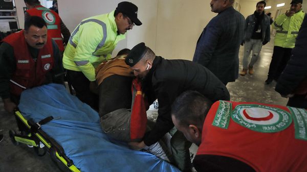 Injured football spectators are brought into an emergency area at the Basra International Stadium following a stampede ahead of this evening's final match of the Arabian Gulf Cup between Iraq and Oman, on January 19, 2023 in Basra. Injured football spectators are brought into an emergency area at the Basra International Stadium following a stampede ahead of this evening's final match of the Arabian Gulf Cup between Iraq and Oman, on January 19, 2023 in Basra. - Sputnik International