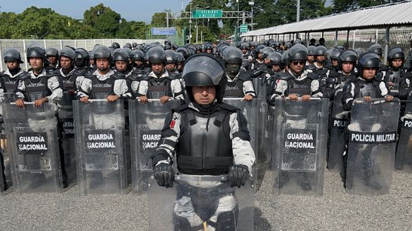 Members of the Mexican National Guard stand on the border between Mexico and Guatemala during a joint operation with Guatemalan authorities and Army to prevent the crossing of migrant caravans in Ciudad Hidalgo, Chiapas state, Mexico, on October 21, 2022. - Sputnik International
