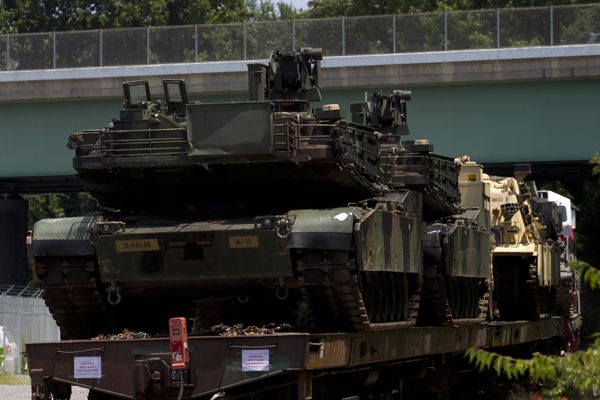 Abrams tanks are seen on a flat car in a rail yard, Tuesday, July 2, 2019. - Sputnik International