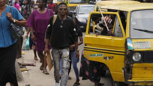 People walk during rush hours in Lagos, Nigeria, Monday, Nov. 14, 2022. The world's population is projected to hit an estimated 8 billion people on Tuesday, Nov. 15, according to a United Nations projection.  - Sputnik International