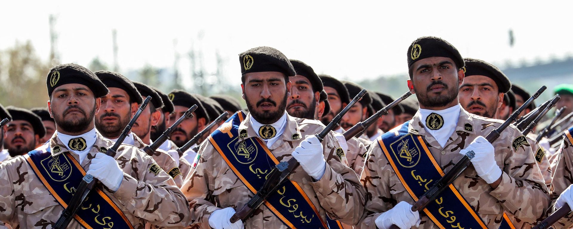 Members of Iran's Revolutionary Guards Corps (IRGC) march during the annual military parade Members of Iran's Revolutionary Guards Corps (IRGC) march during the annual military parade - Sputnik International, 1920, 22.01.2023