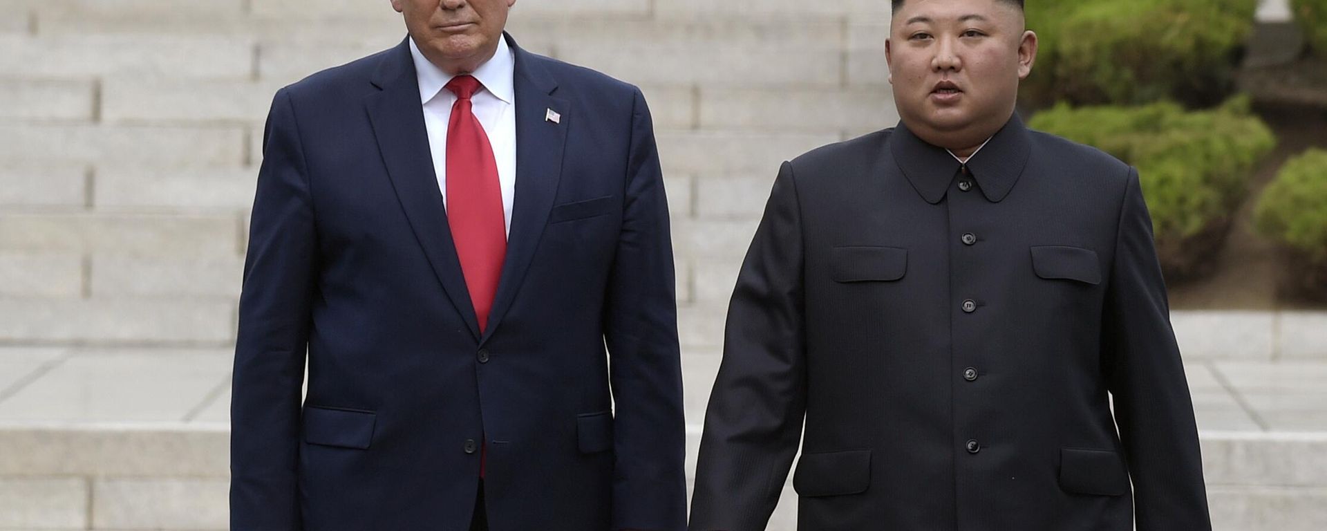 Then US President Donald Trump, left, meets with North Korean leader Kim Jong-Un at the North Korean side of the border at the village of Panmunjom in Demilitarized Zone, on June 30, 2019. Then US President Donald Trump, left, meets with North Korean leader Kim Jong-Un at the North Korean side of the border at the village of Panmunjom in Demilitarized Zone, on June 30, 2019. - Sputnik International, 1920, 25.10.2025