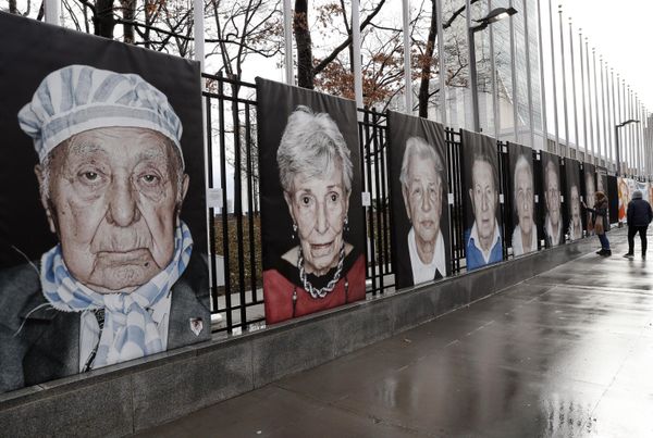 Larger-than-life portraits by Italian photographer Luigi Toscano line a fence bordering United Nations headquarters, January 23, 2018, in New York. The images are part of the exhibition "Survivors, Victims and Perpetrators," in conjunction with the Lest We Forget project, commemorating Holocaust victims and survivors. (AP Photo/Kathy Willens) - Sputnik International