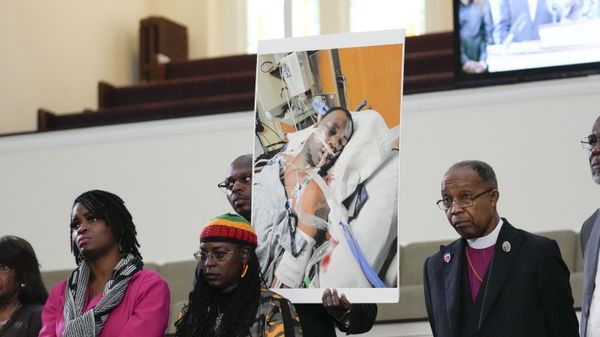 Family members and supporters hold a photograph of Tyre Nichols at a news conference in Memphis - Sputnik International