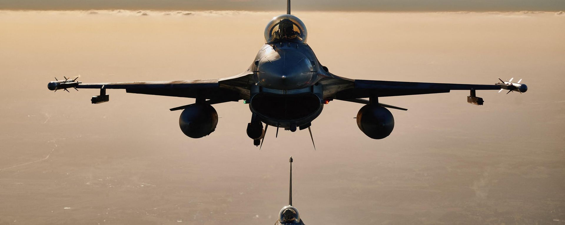 F 16 fighter jets takes part in the NATO Air Shielding exercise near the air base in Lask, central Poland on October 12, 2022 - Sputnik International, 1920, 01.02.2023