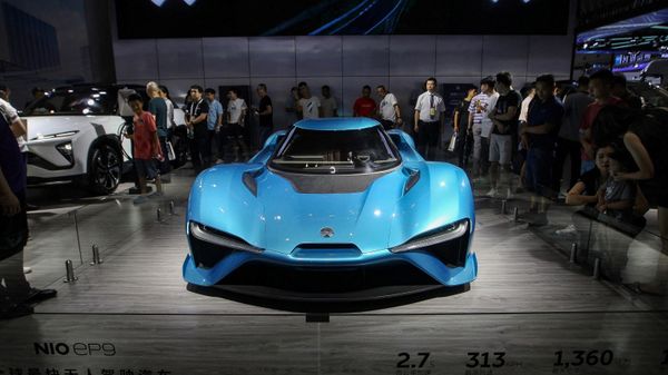 This photo taken on August 26, 2019 shows a NIO EP9 driverless car displayed during the 2019 Smart China Expo in China's southwestern Chongqing. - NIO EP9 can accelerate from 0-100 km/h (62 mph) in 2.7 seconds, and achieve a top speed of 350km/h (217 mph). - Sputnik International