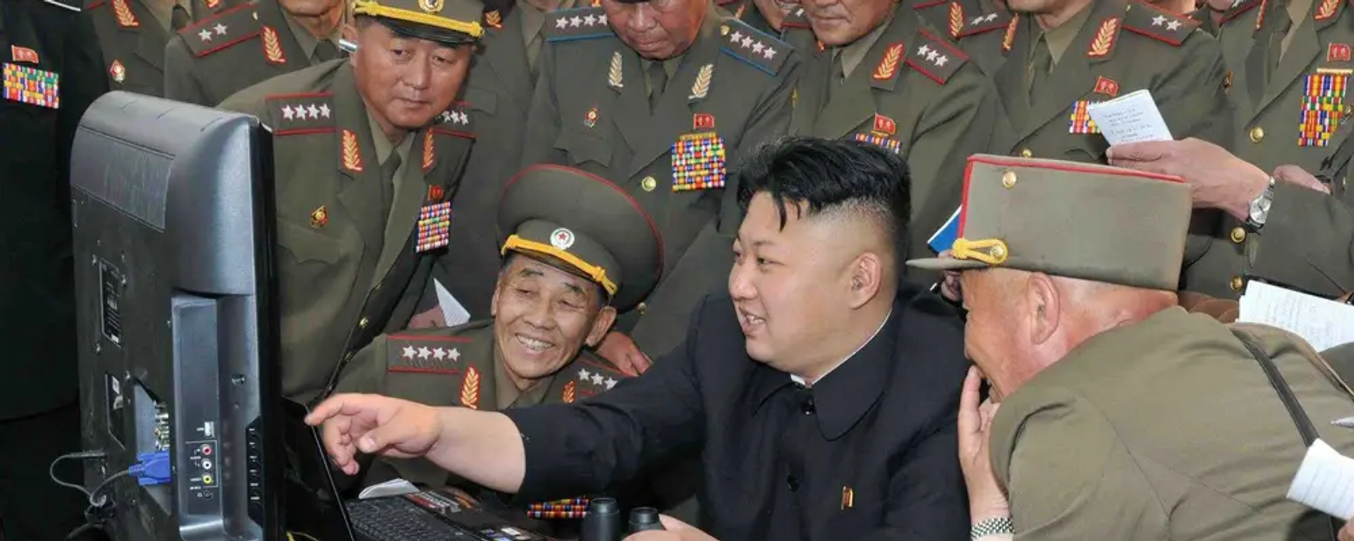 North Korean leader Kim Jong-un with army officers at a computer. File photo. North Korean leader Kim Jong-un with army officers at a computer. File photo. - Sputnik International, 1920, 08.02.2023