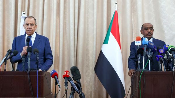 Russian Foreign Minister Sergey Lavrov (left) and Sudanese Foreign Minister Ali As-Sadeq at a press conference following talks in Khartoum. - Sputnik International