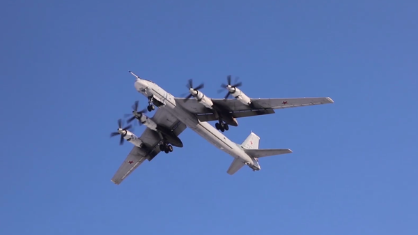 Tu-95MS bomber on patrol in the Russian Far East, Wednesday, February 15, 2023. Screengrab of Russian Defense Ministry video. - Sputnik International