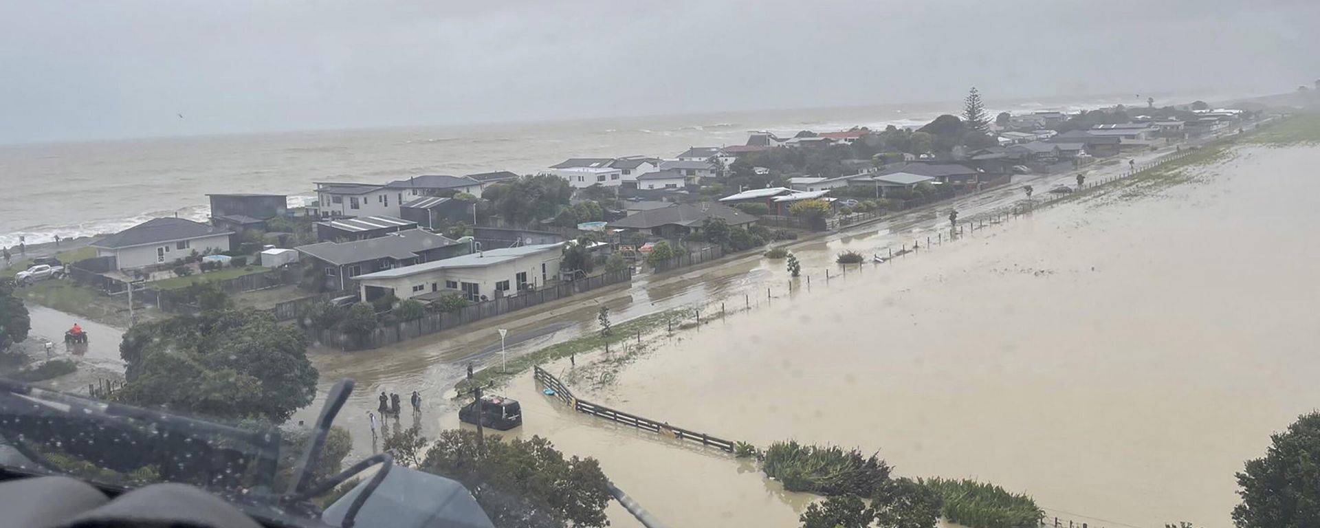 In this image released by the New Zealand Defense Force on Wednesday, Feb. 15, 2023, homes in the Esk Valley, near Napier, New Zealand, are flooded. The New Zealand government declared a national state of emergency Tuesday after Cyclone Gabrielle battered the country's north in what officials described as the nation's most severe weather event in years. (New Zealand Defense Force via AP) In this image released by the New Zealand Defense Force on Wednesday, Feb. 15, 2023, homes in the Esk Valley, near Napier, New Zealand, are flooded. The New Zealand government declared a national state of emergency Tuesday after Cyclone Gabrielle battered the country's north in what officials described as the nation's most severe weather event in years. (New Zealand Defense Force via AP) - Sputnik International, 1920, 19.02.2023