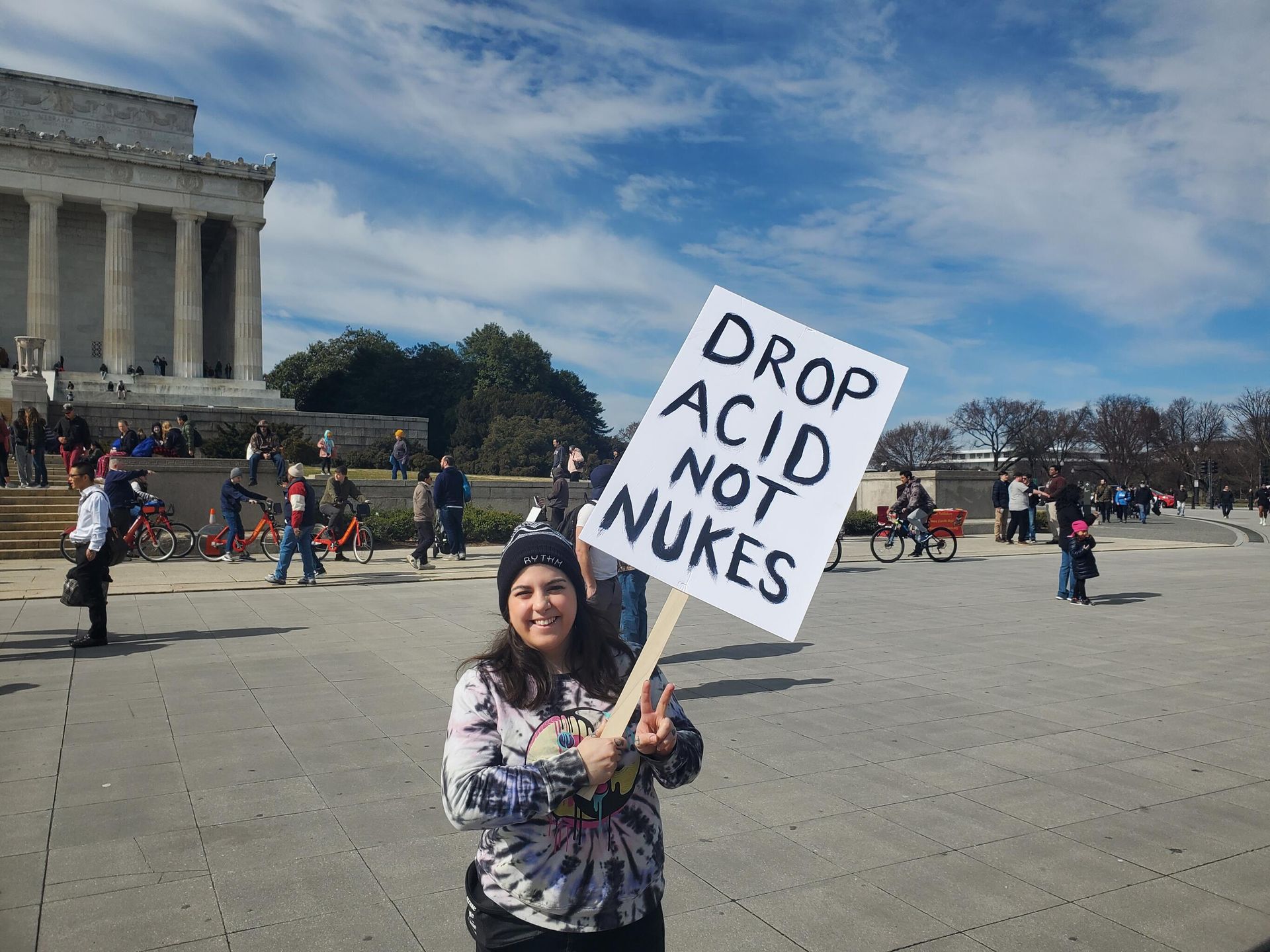 A protester holds a sign Drop Acid Not Nukes at the Rage Against the War Machine Rally in Washington DC on February 23, 2023 A protester holds a sign Drop Acid Not Nukes at the Rage Against the War Machine Rally in Washington DC on February 23, 2023 - Sputnik International, 1920, 20.02.2023