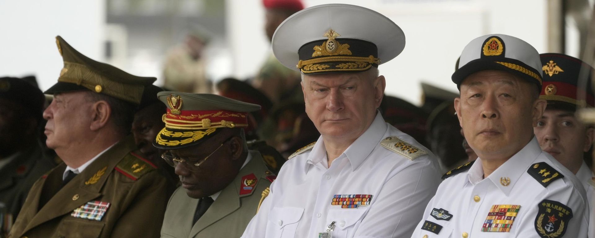 Admiral Nikolai Yevmenov, Commander-in-Chief of the Russian Navy, second right, with Chinese naval officers attend the Armed Forces Day in Richards Bay, South Africa, Tuesday, Feb. 21, 2023 - Sputnik International, 1920, 22.02.2023