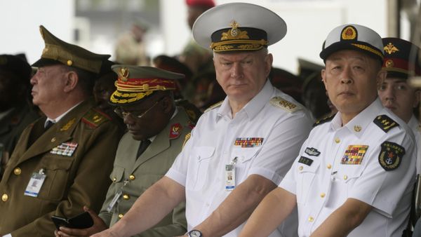 Admiral Nikolai Yevmenov, Commander-in-Chief of the Russian Navy, second right, with Chinese naval officers attend the Armed Forces Day in Richards Bay, South Africa, Tuesday, Feb. 21, 2023 - Sputnik International
