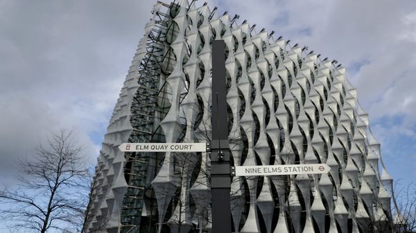 A sign for Nine Elms underground train station stands outside the new United States Embassy building in London. - Sputnik International