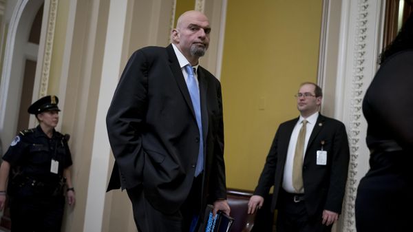 Senator-elect John Fetterman, D-Pa., whose victory helped give Democrats the majority, walks past the Senate before meeting with Senate Majority Leader Chuck Schumer, D-N.Y., at the Capitol in Washington, Tuesday, Nov. 15, 2022. - Sputnik International