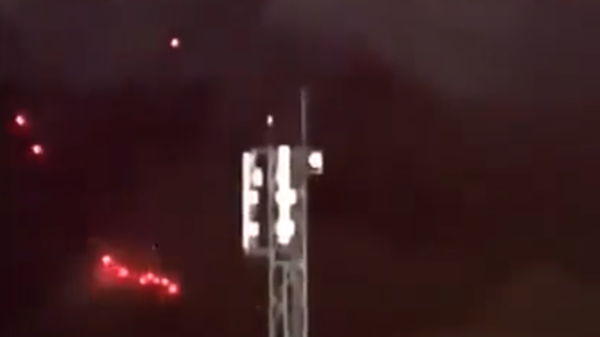 Screenshot captures scene from a overnight training exercise carried out by the Islamic Revolution Guard Corps. The drill had been earlier rumored to be tied to a missile attack against the Iranian city. - Sputnik International
