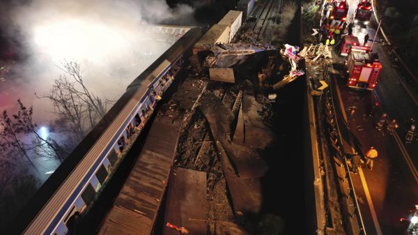 Smoke rises from trains as firefighters and rescuers operate after a collision near Larissa city, Greece, early Wednesday, March 1, 2023. The collision between a freight and passenger train occurred near Tempe, some 380 kilometers (235 miles) north of Athens, and resulted in the derailment of several train cars. - Sputnik International