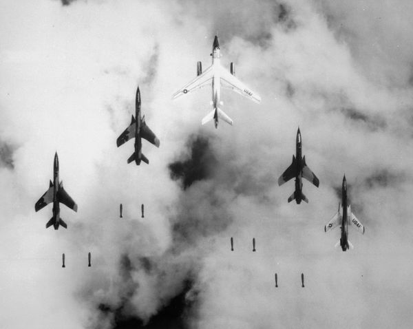 "Flying under radar control with a B-66 Destroyer, Air Force F-105 Thunderchief pilots bomb a military target through low clouds over the southern panhandle of North Vietnam. June 14, 1966." - Sputnik International