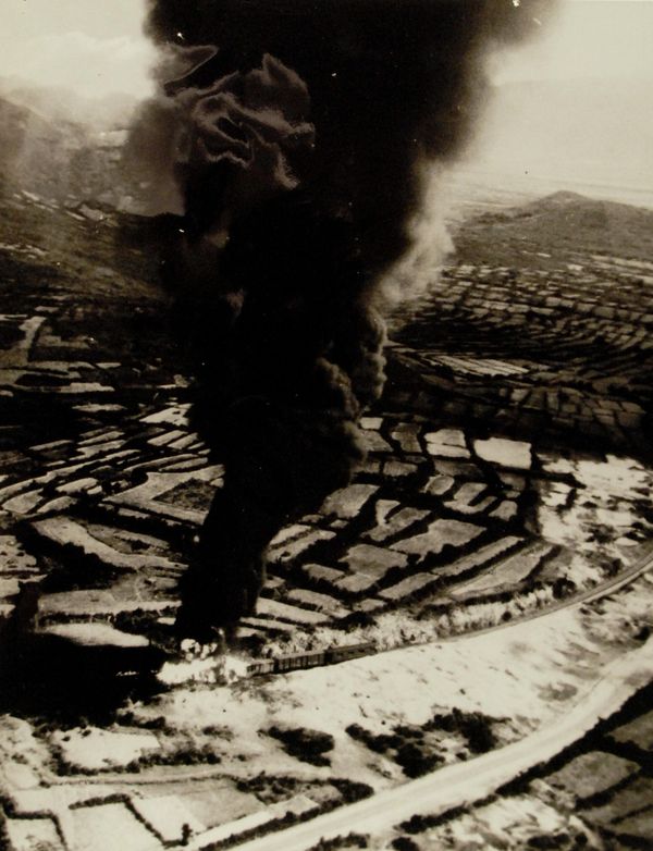 A North Vietnamese supply train burns May 4, 1965, after being bombed by US Navy aircraft from USS Midway (CVA-41). The planes struck about 30 miles north of Vihn on the North Vietnamese coastal railway. Photograph released May 17, 1965.  - Sputnik International