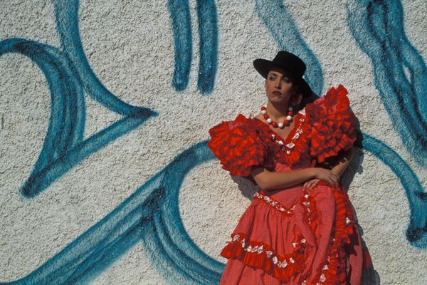 Andalusian woman in typical Sevillanas dress, Spain.  - Sputnik International