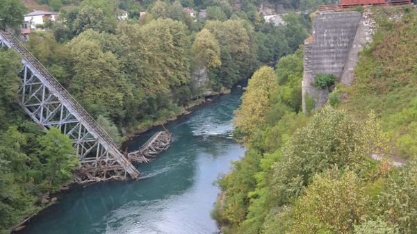 The wreck of the rail bridge over the Neretva River at Jablanica, Bosnia and Herzegovina. The bridge was rebuilt by the Nazis in August 1943, after Yugoslav Partisans under Tito destroyed it the previous March. It was then blown up again in 1968 during a film about the Partisan attack. - Sputnik International
