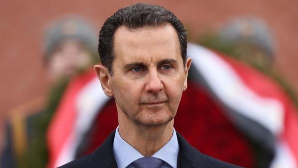 Syrian President Bashar al-Assad laying flowers on the tomb of the Unknown Soldier in Moscow, Russia. March 15, 2023. - Sputnik International