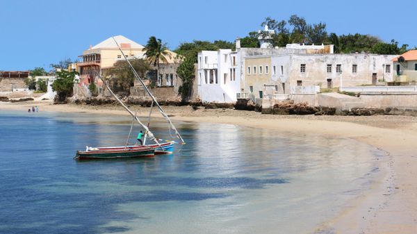 A fishing boat floats off the shores of Ilha de Mozambique, on June 12, 2015.  - Sputnik International