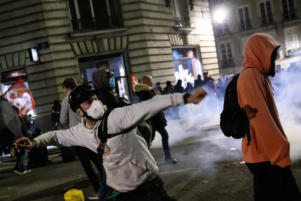 Demonstrators clash with riot police during a demonstration after the French government pushed pension reform through parliament without a vote, invoking Article 49.3 of the constitution, in Nantes, western France, on 16 March 2023. - Sputnik International