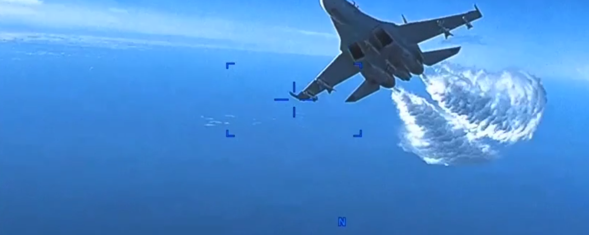 Screengrab of Pentagon video on a US Reaper drone's encounter with a Russian Su-27 fighter jet over the Black Sea. - Sputnik International, 1920, 17.03.2023