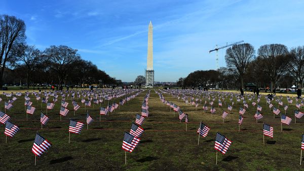 Some 1,892 American flags are installed on the National Mall in Washington, DC, on March 27, 2014. The Iraq and Afghanistan veterans installed the flags to represent the 1,892 veterans and service members who committed suicide that year as part of the We've Got Your Back: IAVA's Campaign to Combat Suicide. - Sputnik International