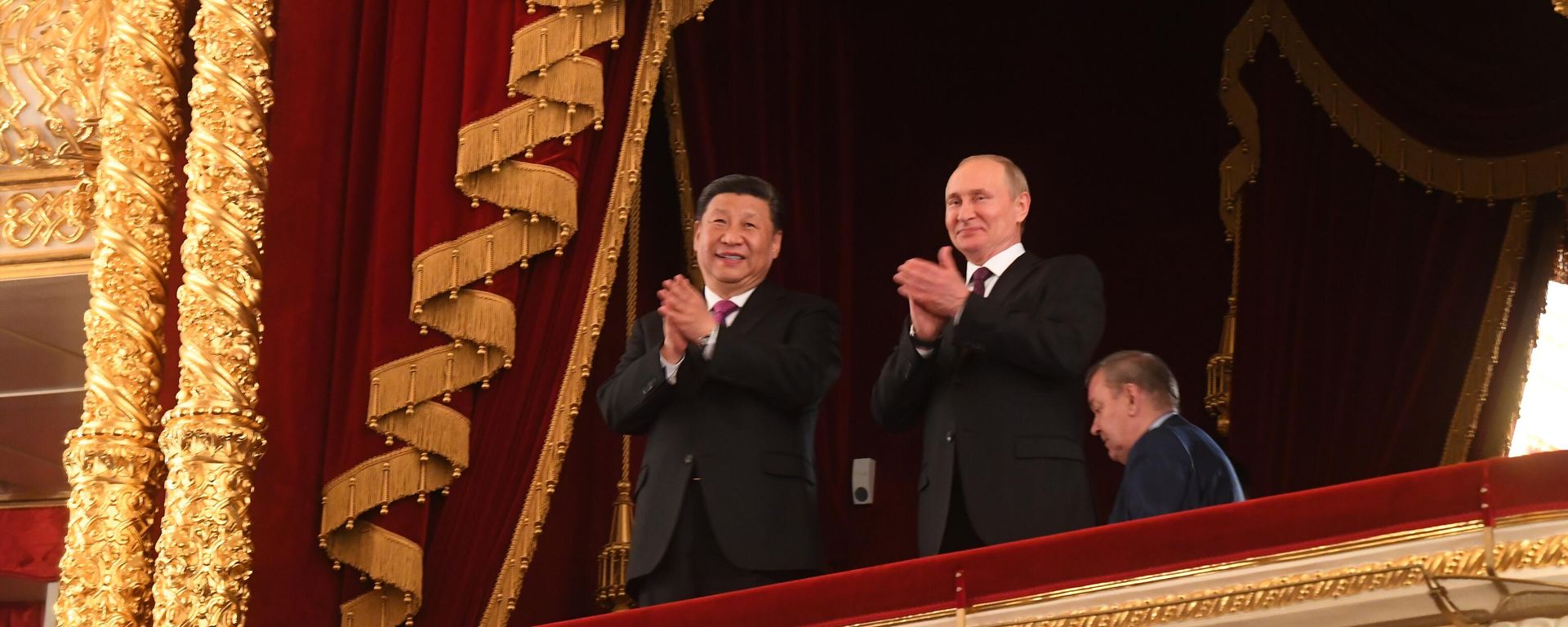 Russian President Vladimir Putin and Chinese President Xi Jinping mark the 70th anniversary of diplomatic relations between the USSR and China at the Bolshoi Theater in Moscow. June 2019. - Sputnik International, 1920, 20.03.2023