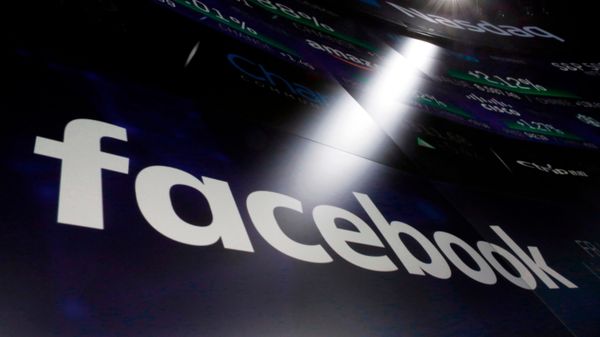 In this March 29, 2018, file photo, the logo for Facebook appears on screens at the Nasdaq MarketSite in New York's Times Square - Sputnik International
