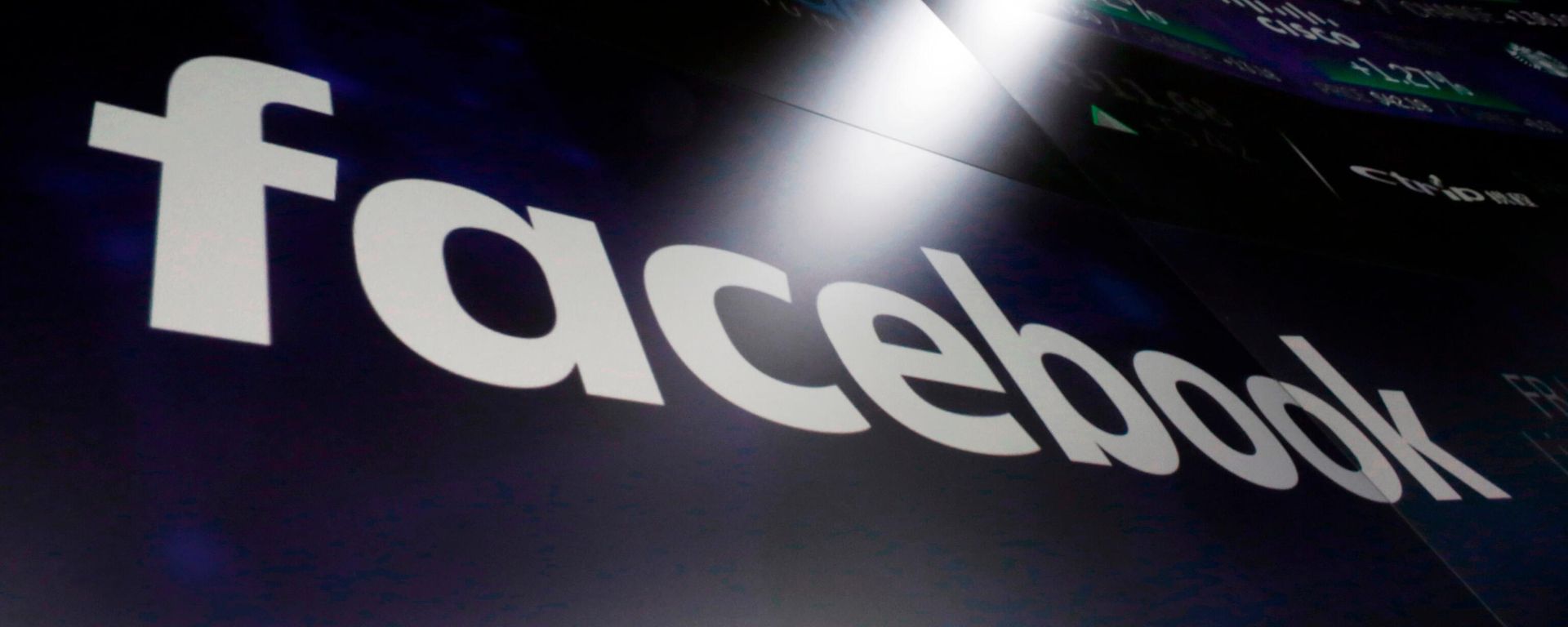 In this March 29, 2018, file photo, the logo for Facebook appears on screens at the Nasdaq MarketSite in New York's Times Square - Sputnik International, 1920, 21.03.2023
