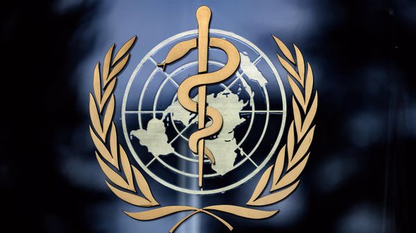 This photograph taken on December 7, 2021 shows a sign of the World Health Organization (WHO) at their headquarters in Geneva.  - Sputnik International