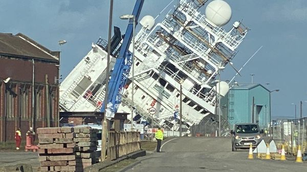 The research vessel Petrel on its side in a Leith dry dock in Edinburgh, Scotland, on March 22, 2023. - Sputnik International