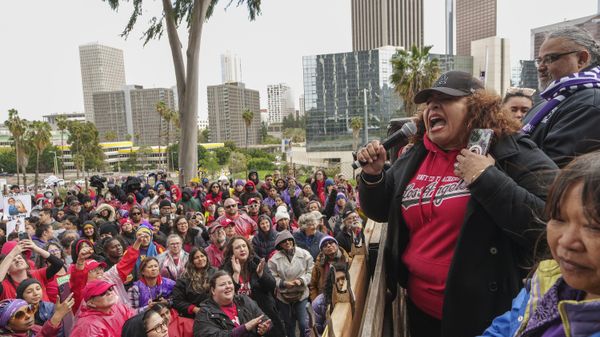 Cecily Myart-Cruz, United Teachers Los Angeles, UTLA President, with Max Arias, executive director of the Service Employees International SEIU Local 99 union, speak to thousands of Los Angeles Unified School District teachers and SEIU members rallying outside the LAUSD headquarters in Los Angeles Tuesday, March 21, 2023. Thousands of service workers backed by teachers began a three-day strike against the Los Angeles Unified School District on Tuesday, shutting down education for a half-million students in the nation's second-largest school system. - Sputnik International