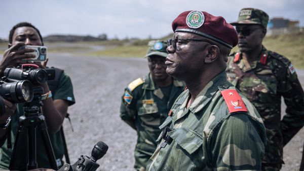 General Emmanuel Kaputa, Deputy chief of staff from the East African Community (EAC) regional force answers journalists during the arrival of Burundian troops at Goma airport in eastern Democratic Republic of Congo on March 5, 2023 General Emmanuel Kaputa, Deputy chief of staff from the East African Community (EAC) regional force answers journalists during the arrival of Burundian troops at Goma airport in eastern Democratic Republic of Congo on March 5, 2023 - Sputnik International