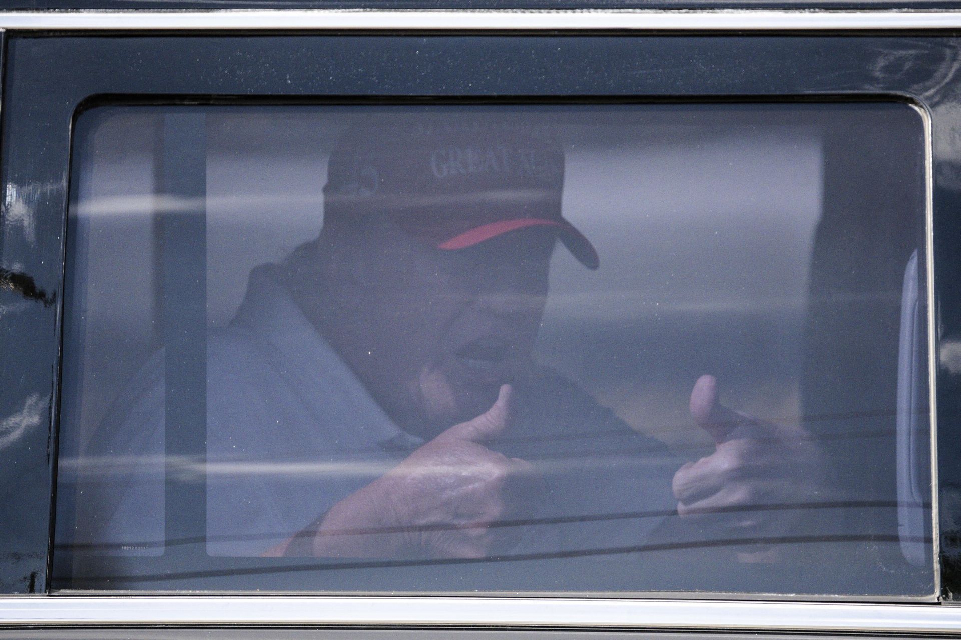 Former US President Donald Trump sits in the rear of his limousine as he departs Trump International Golf Club in West Palm Beach, Florida, on April 1, 2023.  - Sputnik International, 1920, 02.04.2023