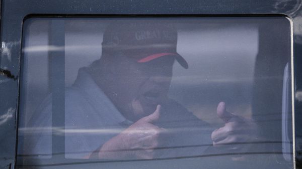 Former US President Donald Trump sits in the rear of his limousine as he departs Trump International Golf Club in West Palm Beach, Florida, on April 1, 2023.  - Sputnik International