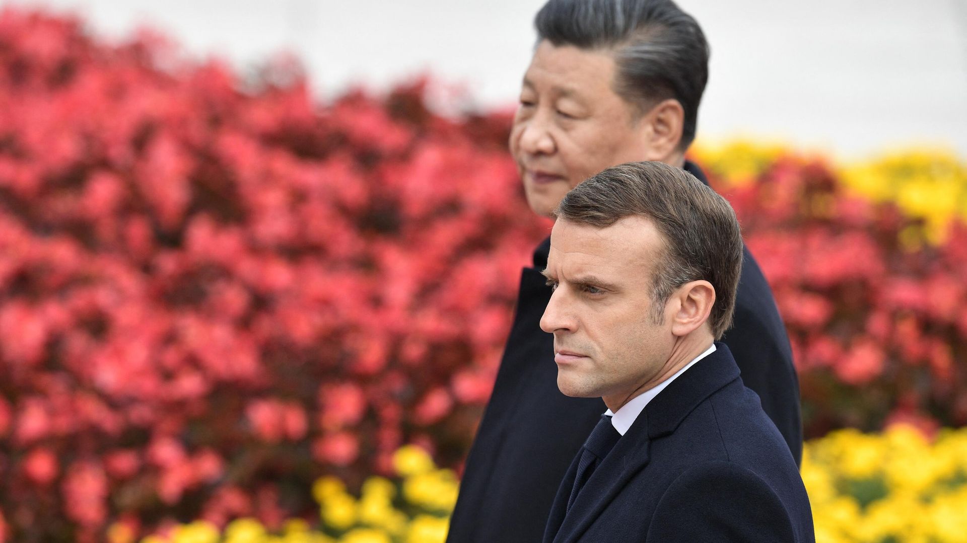 French President Emmanuel Macron walks with Chinese President Xi Jinping during a welcome ceremony at the Great Hall of the People in Beijing, in November 2019. - Sputnik International, 1920, 07.04.2023